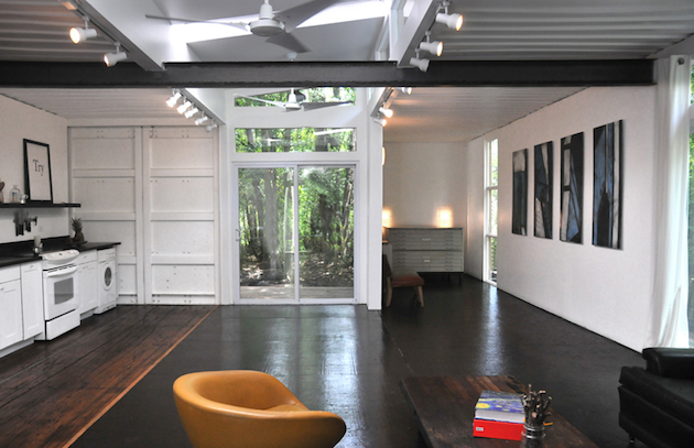 It's sleek, modern, and bright... but what's really interesting about it is that it's made entirely from shipping containers!